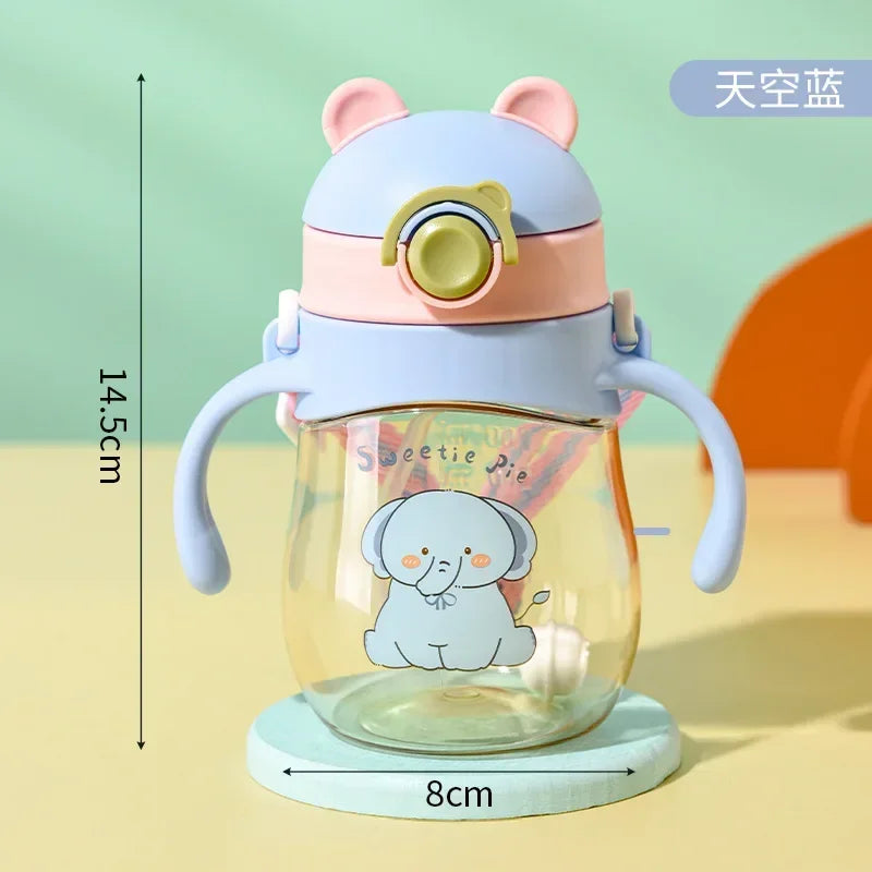 Toddler/Child Sippy or Feeding Cup with a Straw and a Grip Handle.