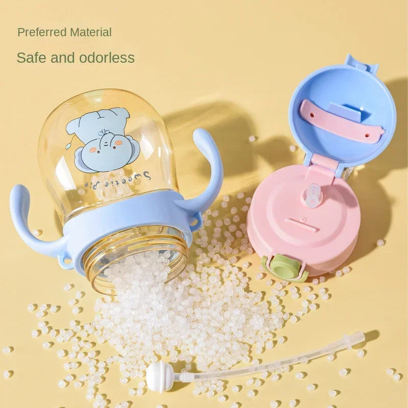 Toddler/Child Sippy or Feeding Cup with a Straw and a Grip Handle.