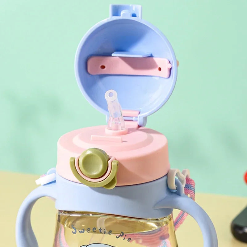 Toddler/Child Sippy or Feeding Cup with a Straw and a Grip Handle.