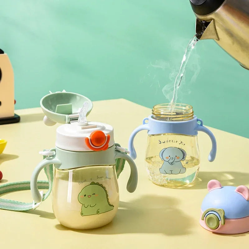 Toddler/Child Sippy or Feeding Cup with a Straw and a Grip Handle.