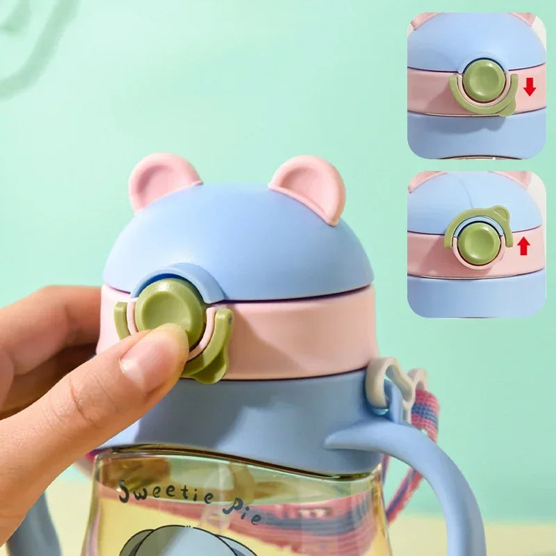 Toddler/Child Sippy or Feeding Cup with a Straw and a Grip Handle.